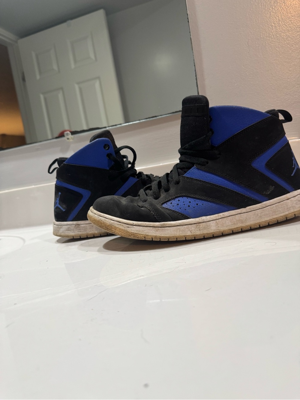 Jordan Black and Royal Blue High-Top Sneakers
